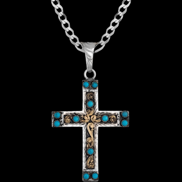 Meet the Isaiah Cross Pendant Necklace, a stunning German Silver Cross featuring intricate scrollwork and 12 turquoise stones. Customize it and add an special discount sterling silver chain today!